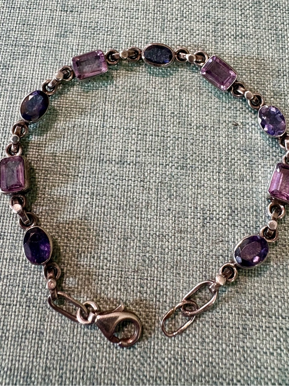 sterling link bracelet with alternating cuts & shades of amethyst